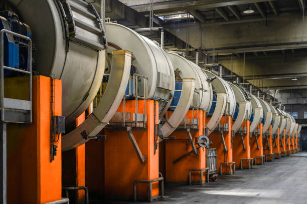 Tannery. Large metal barrels for leather dyeing.
